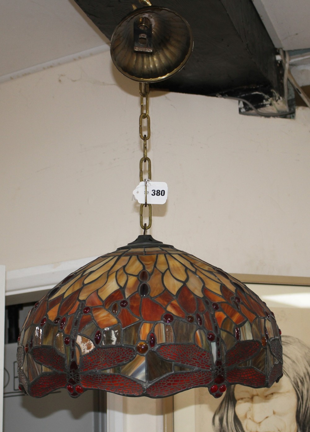 A Tiffany style leaded glass ceiling light, decorated with dragonflies, diameter 41cm, height of bowl 23cm, overall drop approx. 80cm